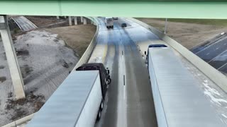 Semi's Sliding Sideways into Each Other on Icy Ramp