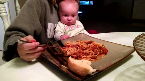 Adorable Baby Girl Demands Mom To Feed Her Spaghetti