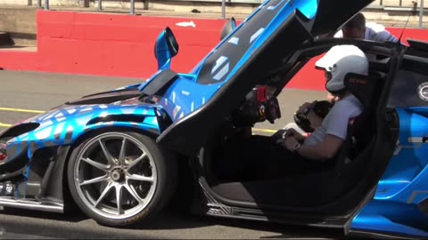 The McLaren Senna GTR excels in aerodynamics and straight-line speed at Donington Park Circuit.