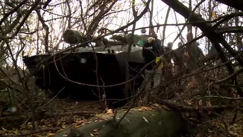 Ukrainian soldier paints war with mud and ash