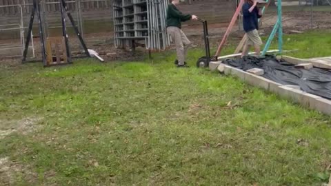 Farmer Daniel Pulls the Handtruck