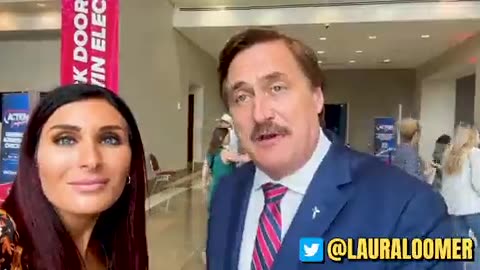 Laura Loomer with Mike Lindell TPUSA 2023