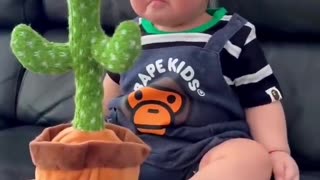 Cute Babies playing with dancing cactus (hilarious) cute baby funny videos