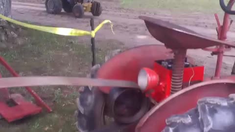 Farmall Cub Tractor Powering Antique Drag Saw