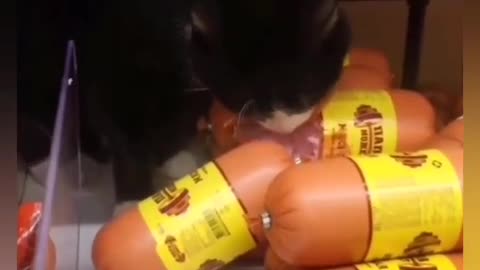 This cat ate all sausages in a shop