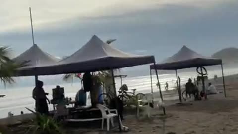 4:20 in afternoon beach scene at the cocal casino jaco beach Costa Rica