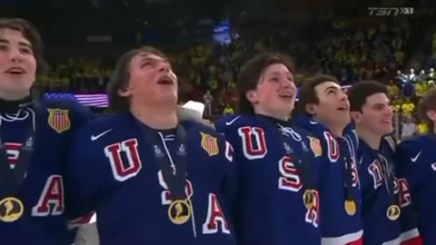 U.S. National Junior Hockey Team loudly, proudly, & patriotically sings the National Anthem