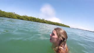 Girl getting attacked by a manatee