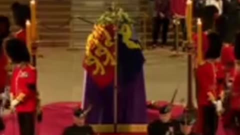 A guard has collapsed while guarding the Queen's coffin