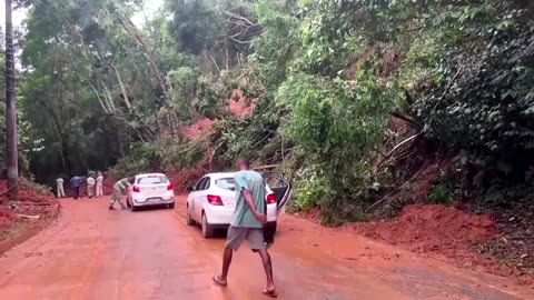 Roads blocked by debris after deadly Brazil floods