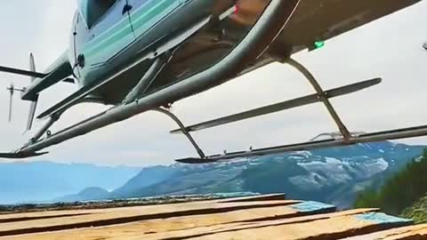 The helicopter that comes to pick you up is too close to you and ready to take off.