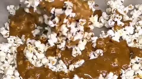 Chocolate popcorn box with caramel corn mousse