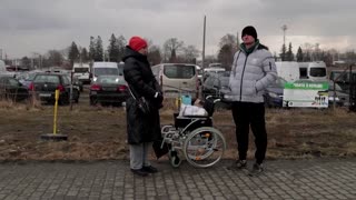 Ukraine refugees arrive at Polish camp