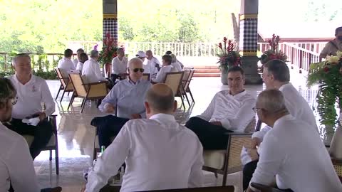 US President Joe Biden wearing dark Aviator Sunglasses joins global leaders at Hutan Mangrove Forest