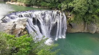 Relaxing Piano Music Over A Waterfall