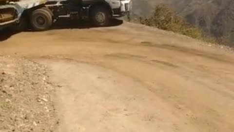 Trailer Carrying Excavator Barely Goes Up Hill