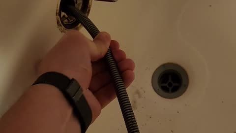 How to snake a clogged drain