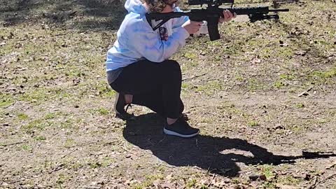 Wife shooting her AR15