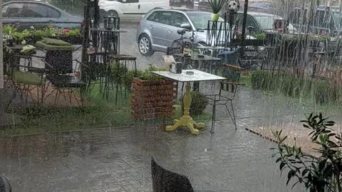 Torrential Rain and Hail Filmed at a Restaurant