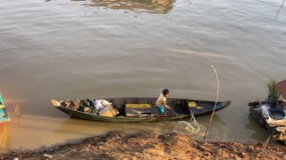 Amazing small boy at his boating skill