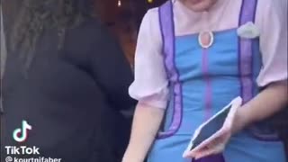 Disney employs a biological male in a dress to greet little girls at the dress store in Disneyland