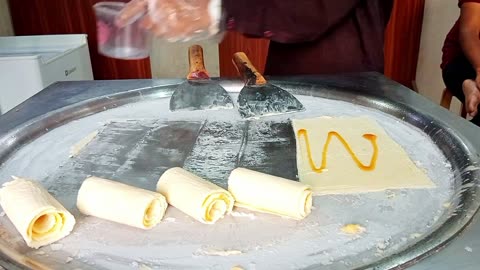 Flat pan ice cream rolls making process
