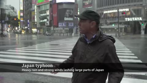 Japan hit by biggest typhoon in decades - BBC News