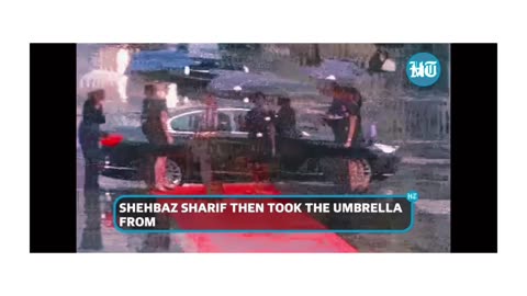 PAK PM 'Pulls' Umbrella From Women Officer In France; She Is Drenched In Rain| Watch