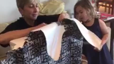 Mom overcome with emotion after opening gift