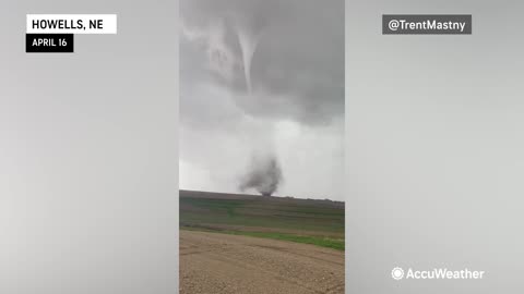 Tornado Swirling Over Nebraska's Open Field