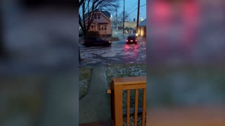 Street turns to river as flooding hits Wisconsin