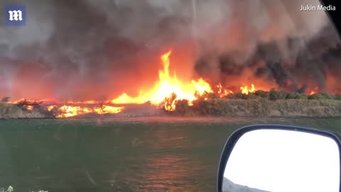 Video shows 'firenado' turns into a giant water spout