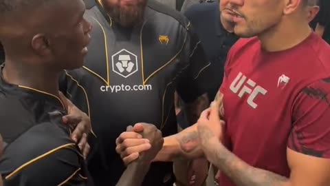 Israel Adesanya and Alex Pereira meet after their fight at UFC 287