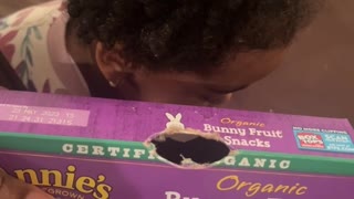 Mom Catches Child Trying to Bite Her Way into Fruit Snacks