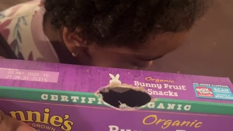 Mom Catches Child Trying to Bite Her Way into Fruit Snacks