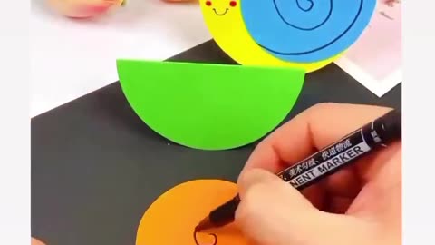 Handicraft ideas with paper snail in motion