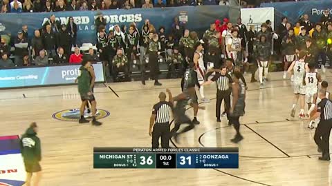 Michigan State with a BUZZER-BEATER at the end of the first half during the Armed Forces Classic 🙌