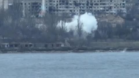 Russian servicemen from the ATGM on the building on the right bank of the Dnieper