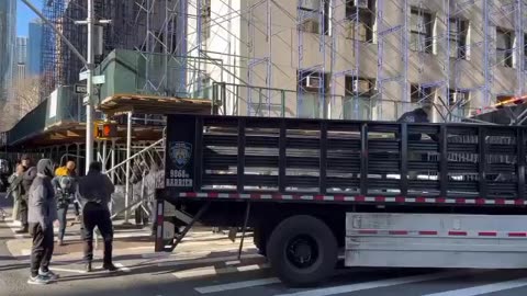 Steel barricades arriving outside Manhattan Criminal Court for Trump supporters