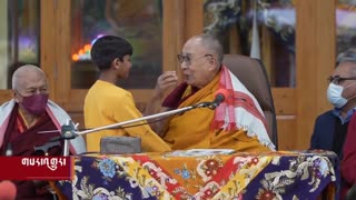 The Dalai Lama and Young boy