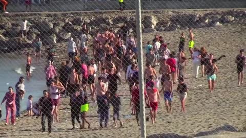 Migrants reach Spain's Ceuta enclave in record numbers – BBC News