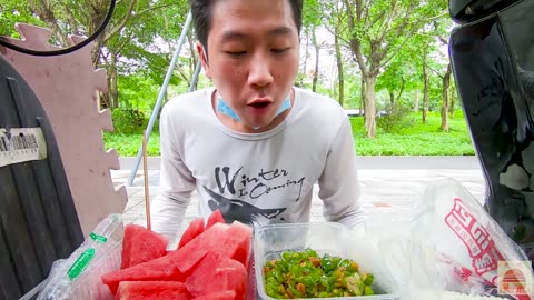 2 bowls of super spicy noodles with millet and pickled peppers, steamed buns