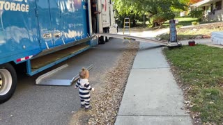 Cute nephew loves big trucks