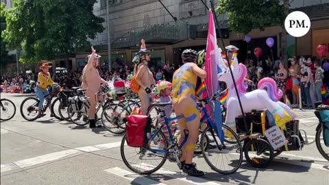 Naked adults riding bikes expose their genitalia to children at Seattle Pride. (WARNNG: NUDITY)