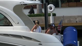 Fun does not stop in Miami even in Fall - Boats Yachts Men Women of all ages on the water !!!!