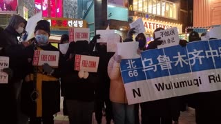 South Korean protesters gather in solidarity with the people of China