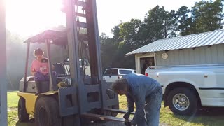 SON FILMS MOM on FORKLIFT