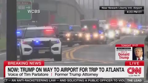 Trump goes to the airport to surrender