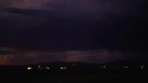 Rain And Lightning From The Dark Sky At Night