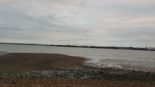 At beach on a cloudy day.